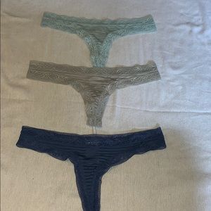 Three never worn thongs